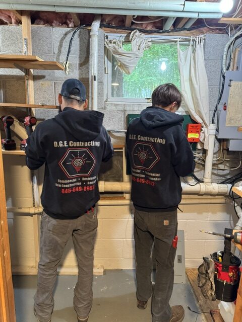 Licensed residential electrician upgrading an electrical panel in Port Jervis, NY.